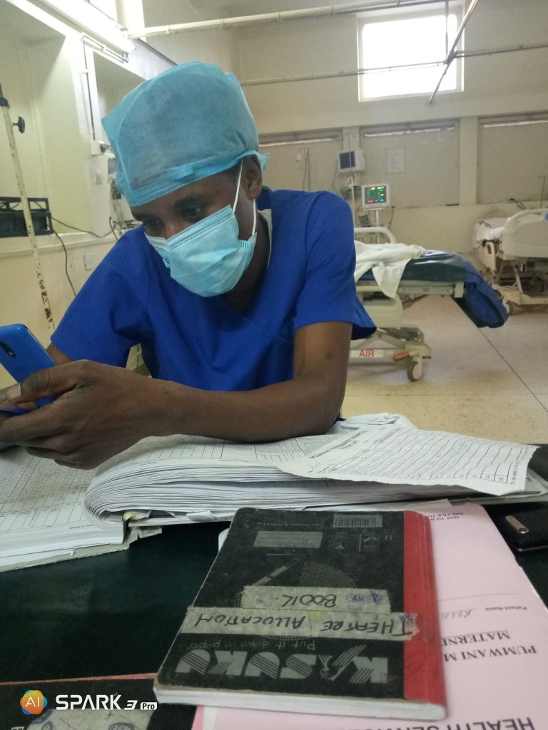 The Psychology of Checklists and Safer Decisions Photograph related to checklists and decision making, showing surgeon team operating checklist.